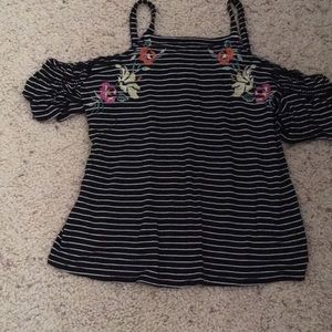 Stripped black and white shirt (flowers on them)